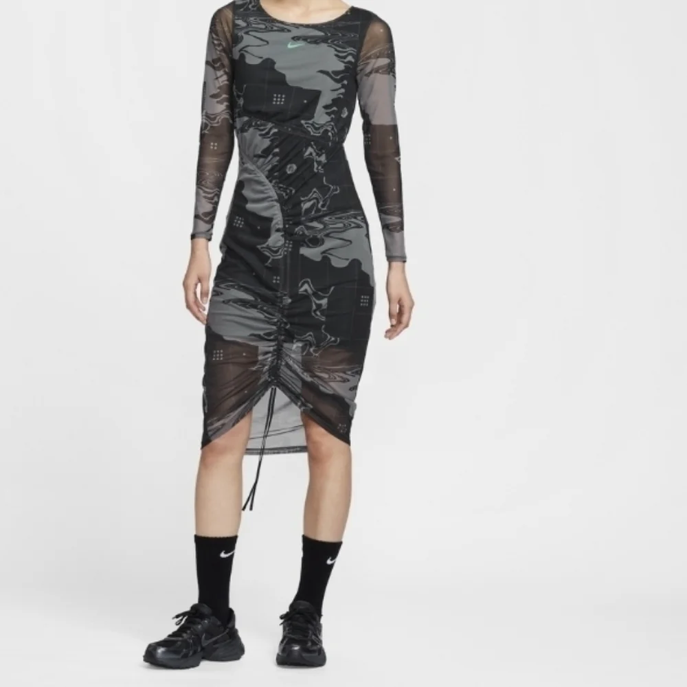 Serena Williams Design Crew crafted this layered mesh midi dress